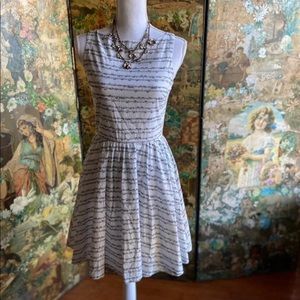 Sheet Music dress, by Paint the Town.